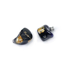 Moritz Audio ENZO Flagship In-Ear Monitors, dark purple with gold flake accents, and 'Moritz' written in gold on the left earbud