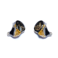 Moritz Audio ENZO Flagship In Ear Monitors, black and gold IEMs with intricate gold leaf design and metallic nozzles