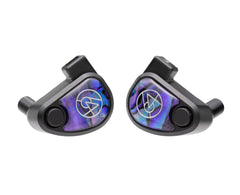 64 Audio Volür universal IEM earphones with ten hybrid drivers, featuring iridescent purple and blue faceplates with silver logo on a white background.