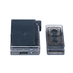 Two electronic devices, one black and one transparent with buttons, on a white background.