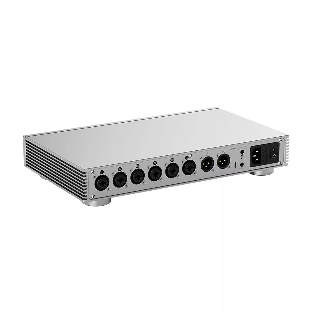 Silver audio interface with multiple ports on a white background